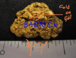 Custom Golf Hat Clip Process - This image was sent to us by a client for us to turn into hat clip with ball marker. This image shows a nugget of gold.